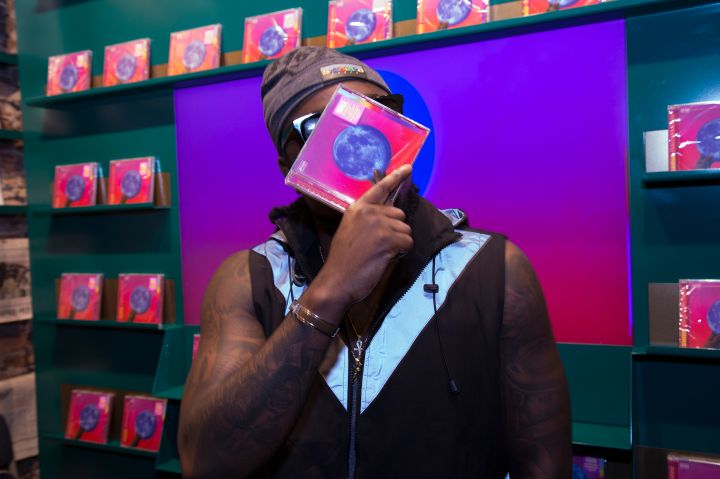 Wale Signs Copies Of His New Album 'Shine'