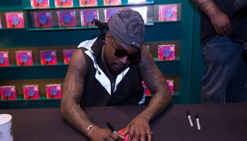 Wale Signs Copies Of His New Album 'Shine'