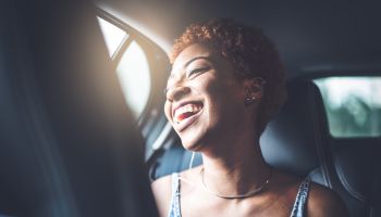 Afro girl inside a car