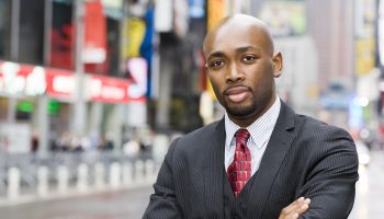 African American Businessman Portrait in Times Square, Copy Space