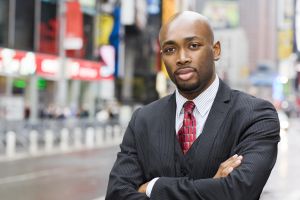 African American Businessman Portrait in Times Square, Copy Space