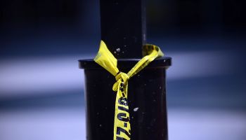 WASHINGTON, DC - AUGUST 17: Yellow police tape is left on a pol