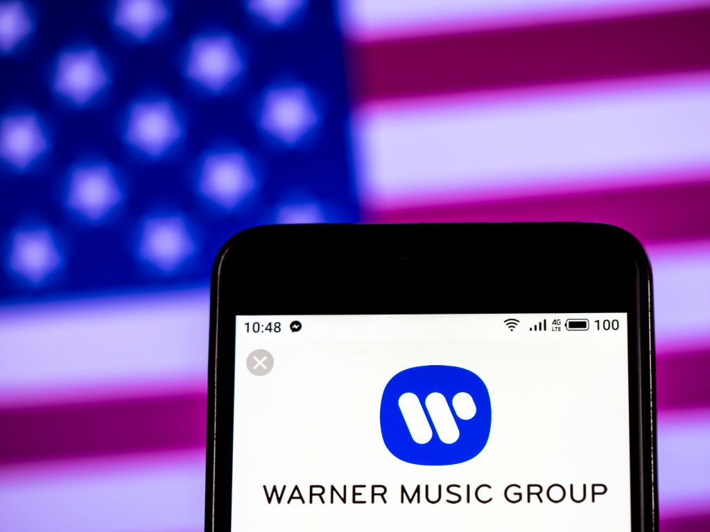 Warner Music Group company logo seen displayed on a smart