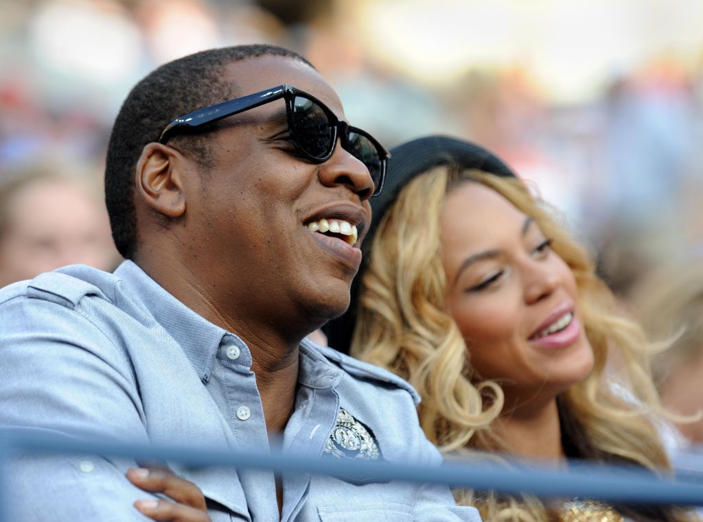 Entertainer Jay-Z (L) and wife Beyonc� (