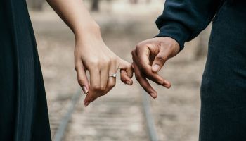 Couple in love holding hands