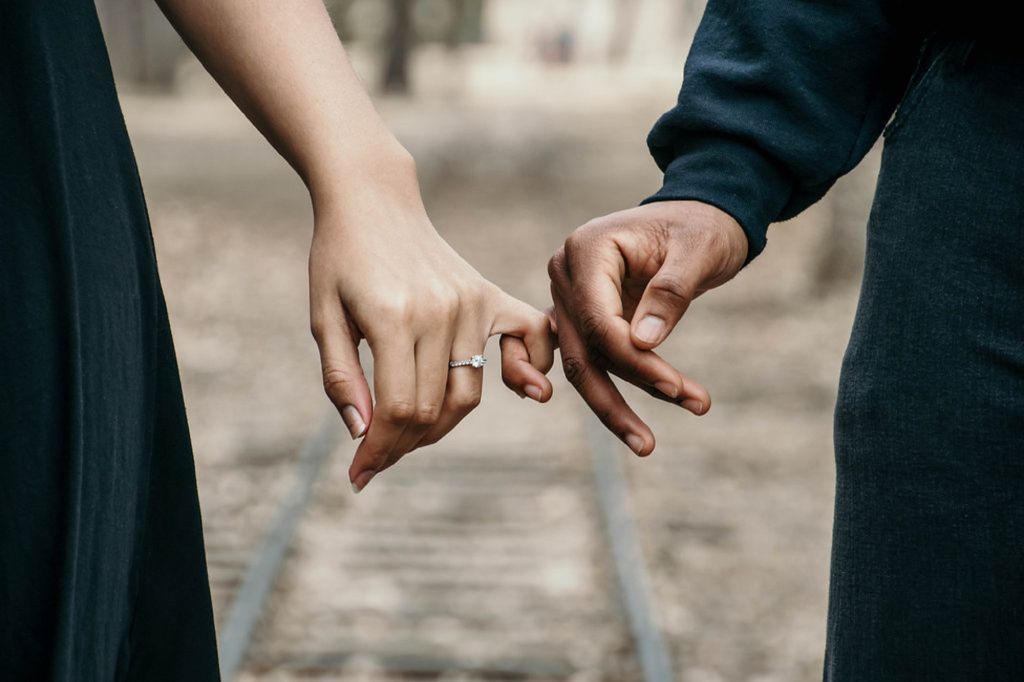 Couple in love holding hands
