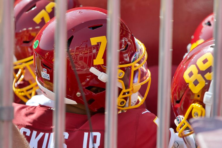 Washington Football Team QB Dwayne Haskins Jr. huddles in tunnel