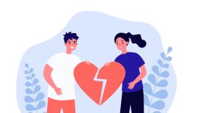 Man and woman holding broken heart together